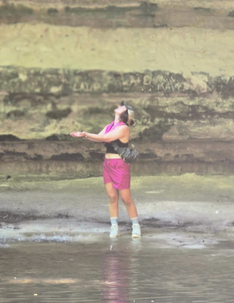 Welcome to wildground Living 7 woman standing under water fall