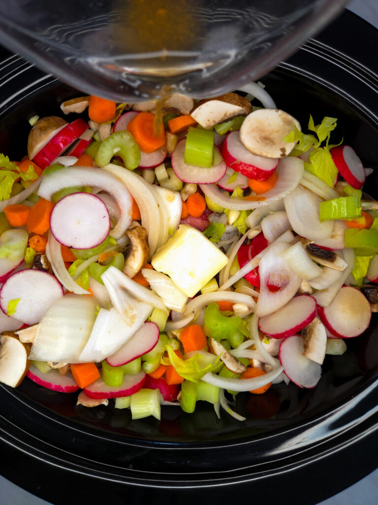 chuck roast and vegetables in a crock pot