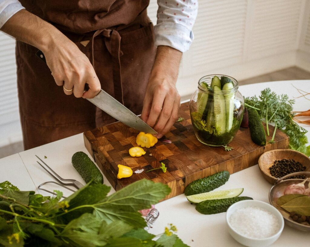 chopping whole food ingredients on a cutting board 